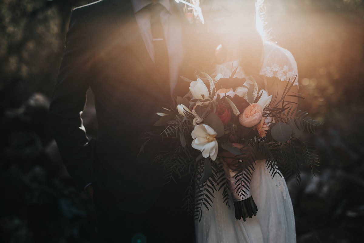 Bride and groom walking outdoors during golden hour wedding portraits in Atlanta